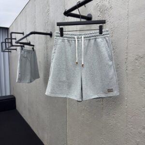 MIUMIU embroidered and labeled fringed shorts