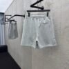MIUMIU embroidered and labeled fringed shorts