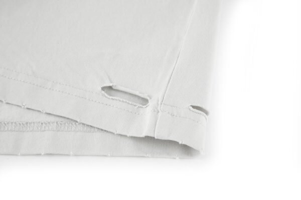 2-1-4-6.jpg Balenciaga’s vision chart print cuts through the short sleeve