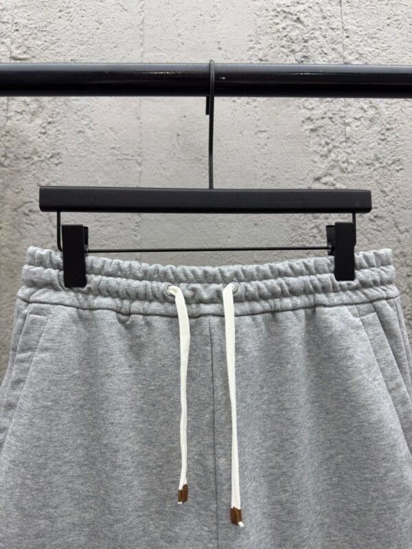 MIUMIU embroidered and labeled fringed shorts