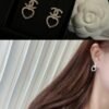 CHAN 23 Full diamond Hollowed-out heart-shaped double c stud earrings