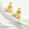 Dior four-letter double-ball pearl stud earrings