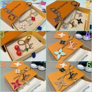 266556.jpg Louis Vuitton keychain bag pendant One of the hallmarks of the Fleur de Monogram bag