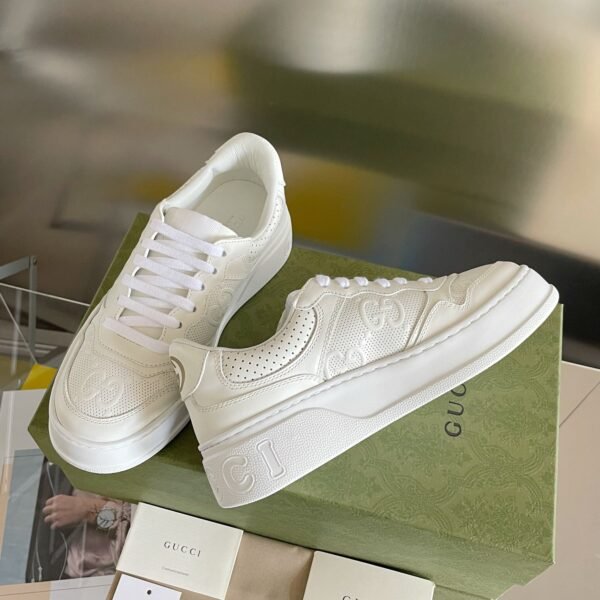 Gucci chunky b pair sneakers
