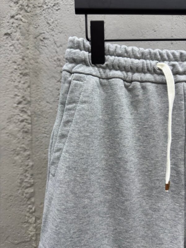 MIUMIU embroidered and labeled fringed shorts