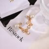 Dior CD knitted diamond stud earrings