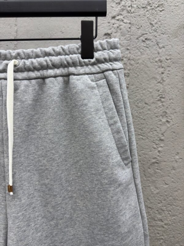 MIUMIU embroidered and labeled fringed shorts