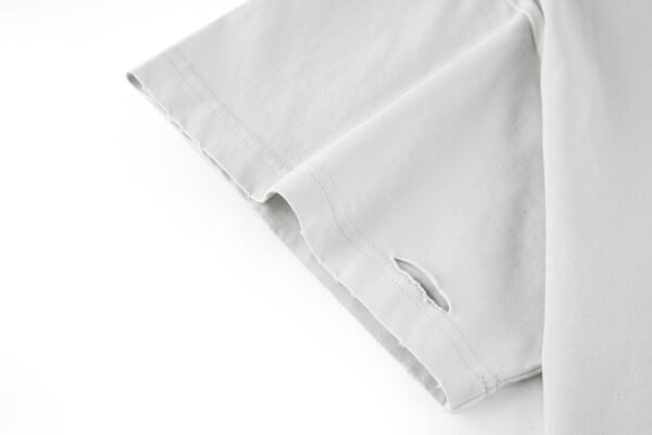 5-1-4-6.jpg Balenciaga’s vision chart print cuts through the short sleeve
