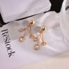 Dior CD knitted diamond stud earrings