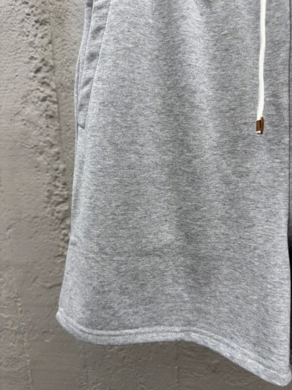 MIUMIU embroidered and labeled fringed shorts