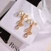 Dior CD knitted diamond stud earrings