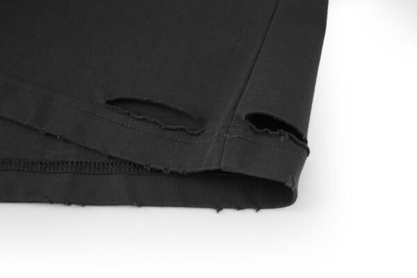 6-7-6.jpg Balenciaga’s vision chart print cuts through the short sleeve