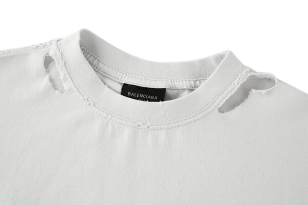 7-1-4-5.jpg Balenciaga’s vision chart print cuts through the short sleeve