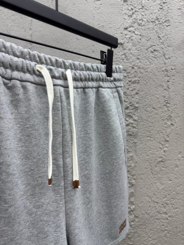 MIUMIU embroidered and labeled fringed shorts