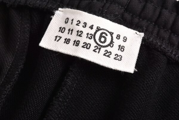 Magira small label tape sportswear casual pants