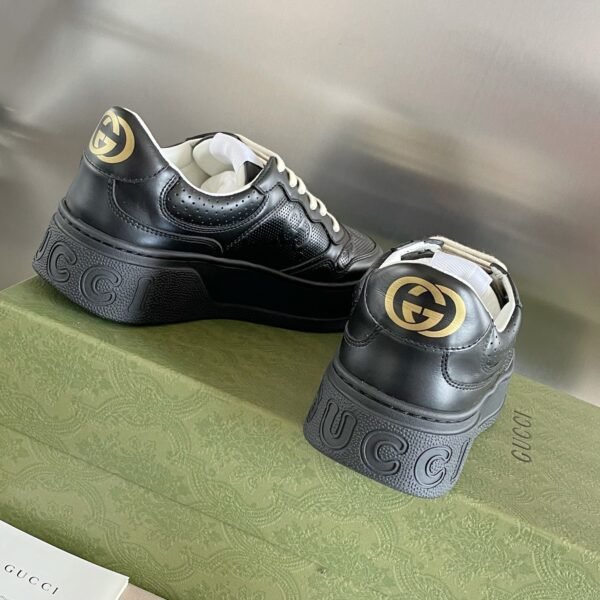 Gucci chunky b pair sneakers