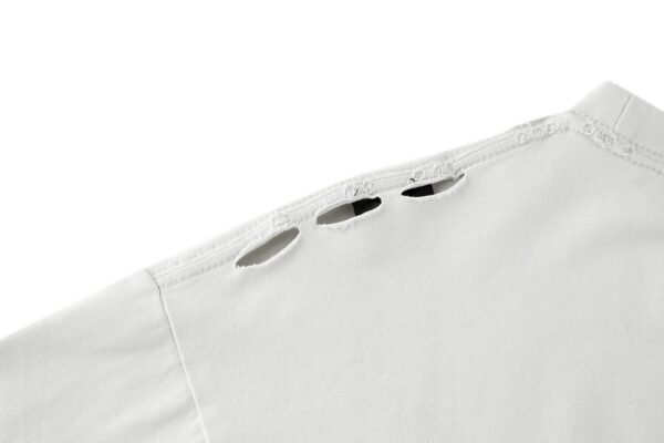 8-1-4-5.jpg Balenciaga’s vision chart print cuts through the short sleeve