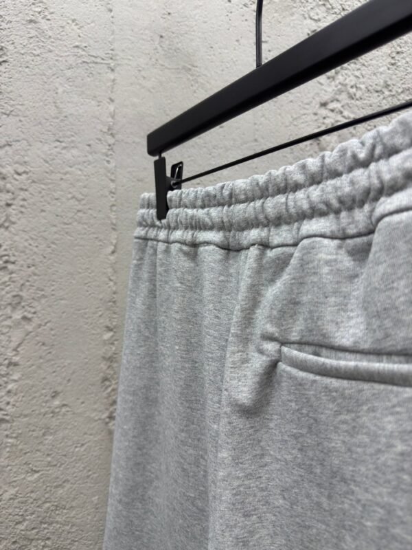 MIUMIU embroidered and labeled fringed shorts