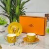 Hermès Gold Coffee Cup and Saucer Set