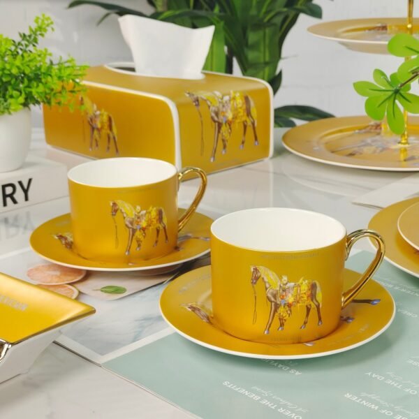 Hermès Gold Coffee Cup and Saucer Set