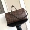 Louis Vuitton Keepall 50 travel bag is made of the new iconic Monogram Eclopse canvas and measures 50x29x23cm