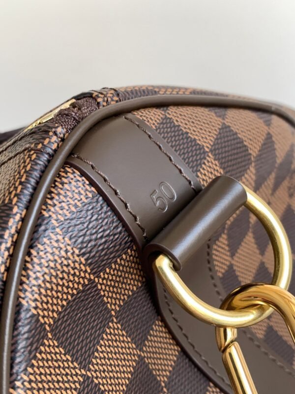 Louis Vuitton Keepall 50 travel bag is made of the new iconic Monogram Eclopse canvas and measures 50x29x23cm