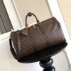 Louis Vuitton Keepall 50 travel bag is made of the new iconic Monogram Eclopse canvas and measures 50x29x23cm