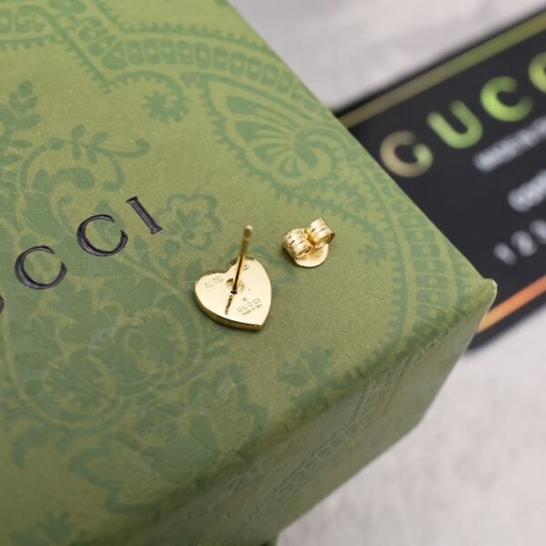 GUCCI asymmetric earrings