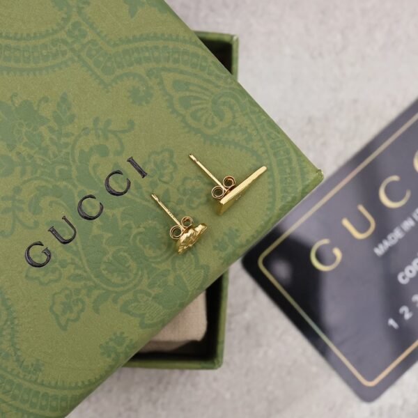 GUCCI asymmetric earrings