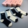MIUMIU high socks, combed cotton, four pairs per box