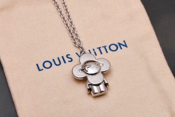 Louis Vuitton Vivienne pendant in polished metal with LV lettering