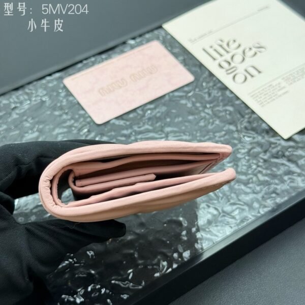 miumiu Pocket small wallet cowhide material