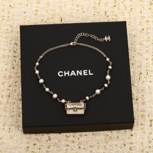 Chanel Black lace bag necklace
