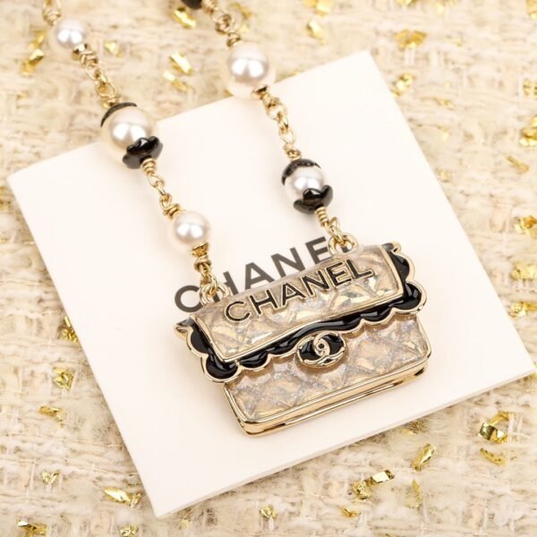 Chanel Black lace bag necklace