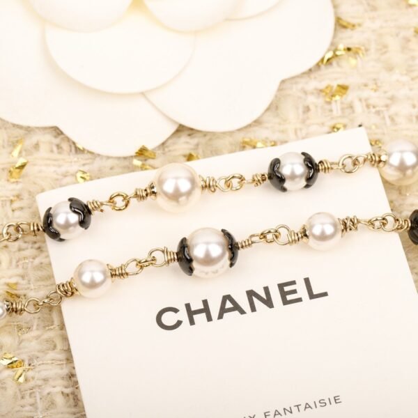 Chanel Black lace bag necklace