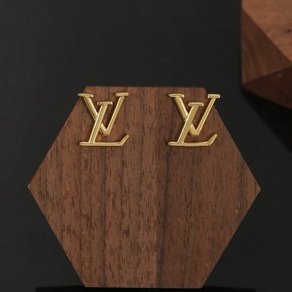 Louis Vuitton gold letter earrings