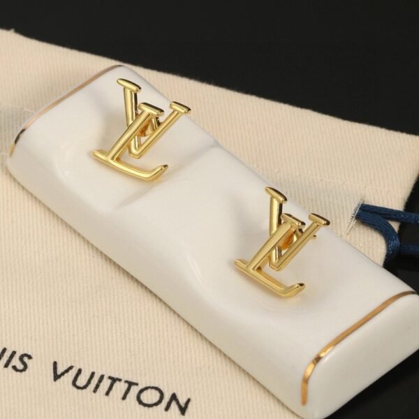 Louis Vuitton gold letter earrings
