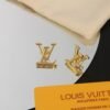 Louis Vuitton gold letter earrings