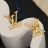 Louis Vuitton gold letter earrings