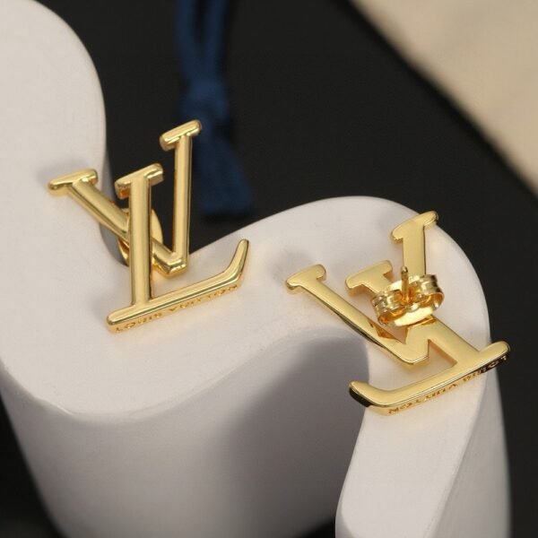 Louis Vuitton gold letter earrings