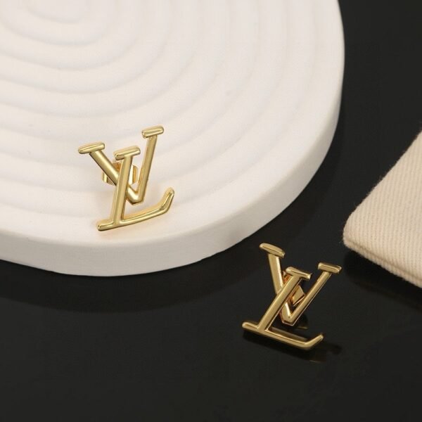 Louis Vuitton gold letter earrings