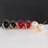 YSL pearl earrings  Inlaid with YSL logo, two large and one small