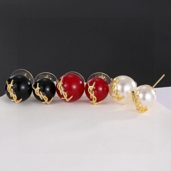 YSL pearl earrings  Inlaid with YSL logo, two large and one small