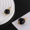 YSL pearl earrings  Inlaid with YSL logo, two large and one small