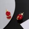 YSL pearl earrings  Inlaid with YSL logo, two large and one small