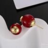 YSL pearl earrings  Inlaid with YSL logo, two large and one small