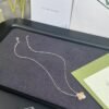 Van Cleef & Arpels Single Diamond Carved Clover Necklace