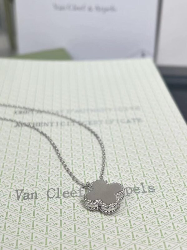 Van Cleef & Arpels Single Diamond Carved Clover Necklace