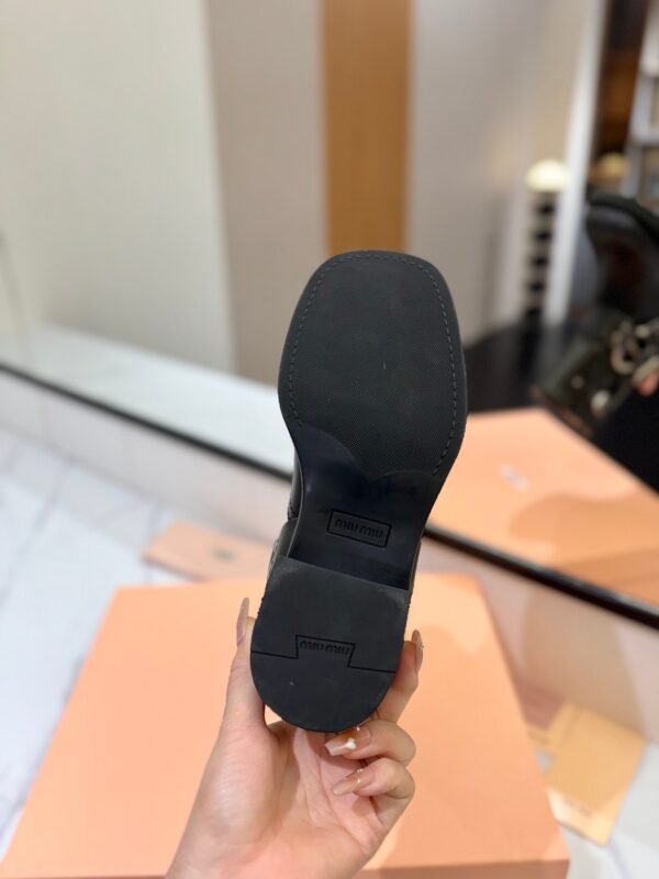 Miu Miu’s new runway style Dr. Martens riding boots, made of premium cowhide leather.