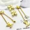 Louis Vuitton diamond floral tassel letter earrings